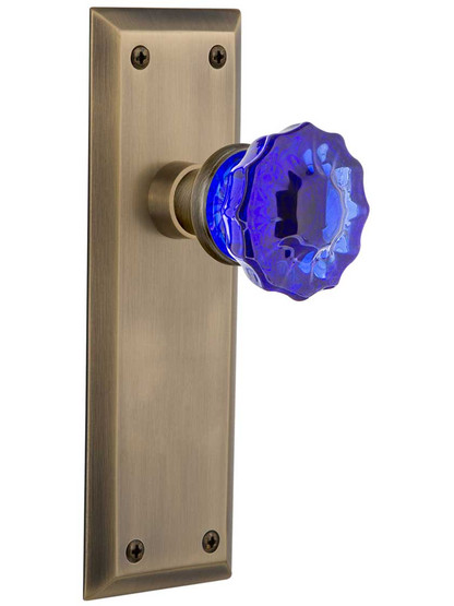 New York Door Set with Colored Fluted Crystal Glass Knobs Cobalt Blue in Antique Brass.